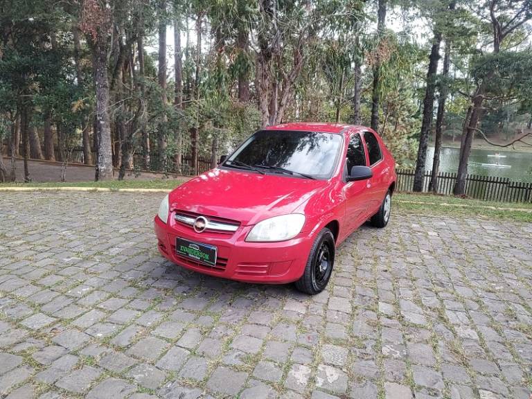 CHEVROLET - PRISMA - 2009/2010 - Vermelha - R$ 26.900,00